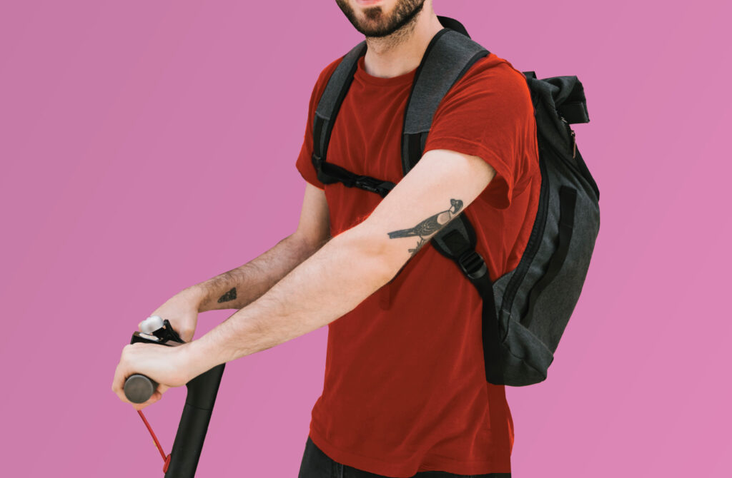 Man Riding Scooter